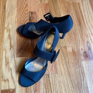 Black buckled heels
